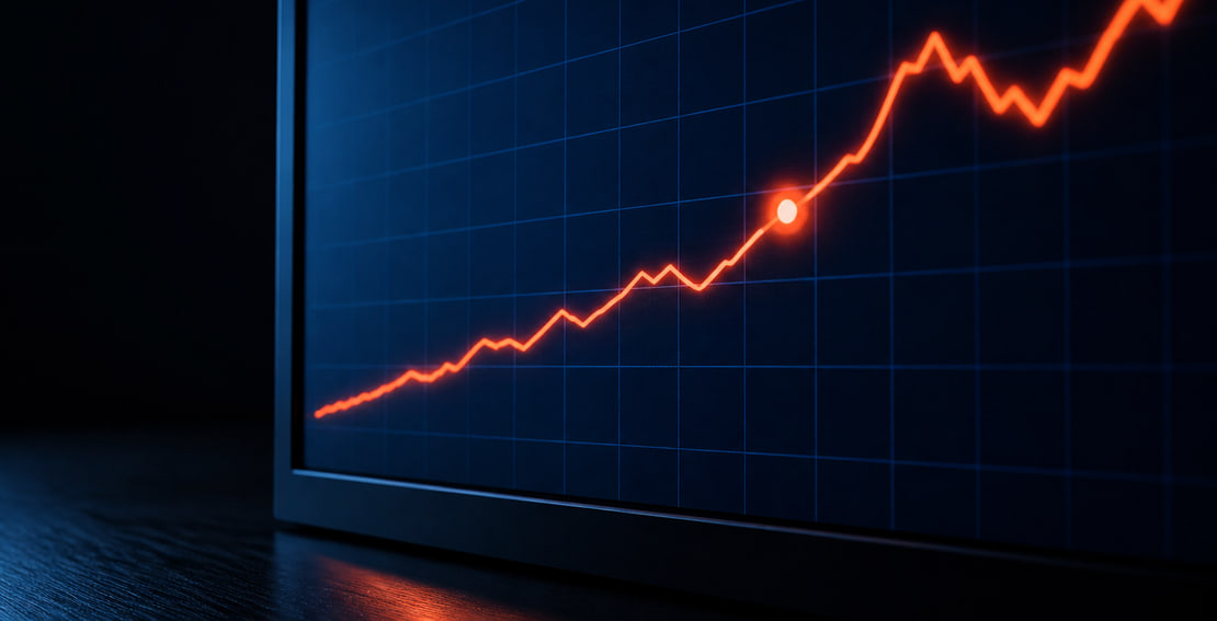 Close-up of a screen tracing a rising performance line across a grid